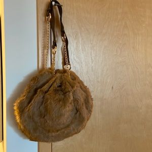 Brand new faux fur shoulder purse! Brand is BCBGgirls
